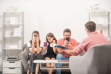 phone addicted mom dad and daughter. life insurance and adoption.