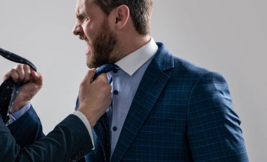 Experiencing aggression at work. Angry professional man fight with colleague. Workplace aggression