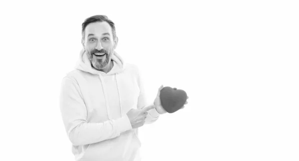 This is for you. happy handsome mature man with beard and moustache in hoody hold heart shape box — Stock Fotó