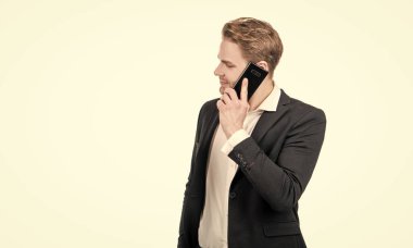 Business man in formalwear talk on cellphone isolated on white copy space, mobile talking