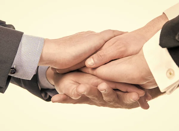 Men holding helping hands expressing support, trust — Stock Photo, Image