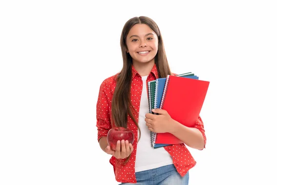 Gelukkig schoolmeisje met copybook. Tienermeisje met notitieboekje. terug naar school. kind met appel lunch — Stockfoto