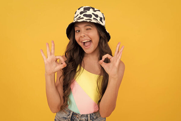 ok gesture. childhood happiness. summer party look. happy funny kid in bucket hat.