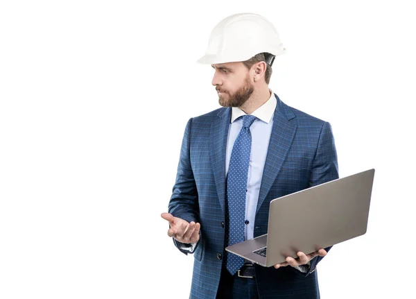 Civil engineer in hardhat and suit hold laptop computer isolated on white copy space, computing — Stock Photo, Image