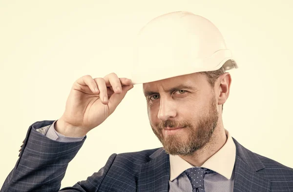 Successful man with greeting gesture. entrepreneur in protective helmet. chief architect engineer — Stock Photo, Image