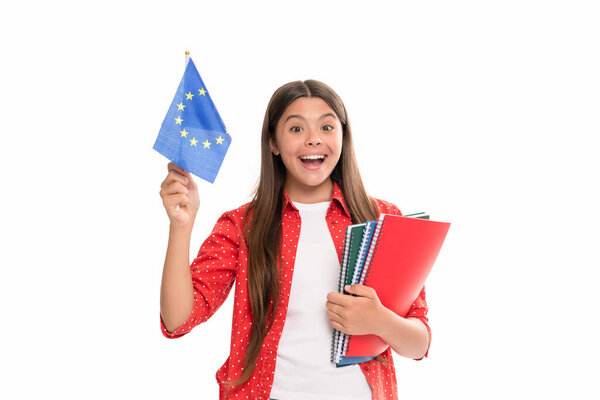 amazed kid study abroad. travel and learn foreign language. teen girl hold european union flag