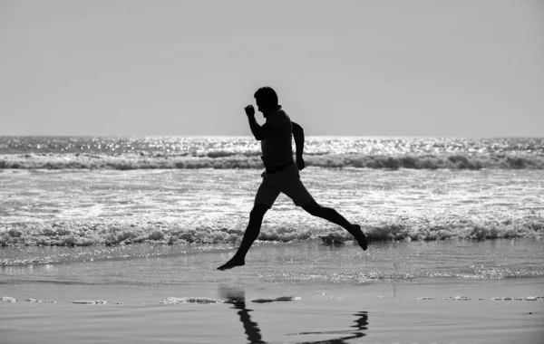 Endurance and stamina. sport athlete run fast to win in sea. morning workout activity. — Stock Photo, Image