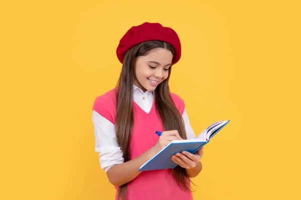 Tween and youth. homework education. happy french teen girl hold notebook. — Zdjęcie stockowe