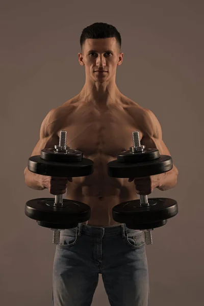 For arm strength. Shirtless man do dumbbell workout. Strength exercises — Stock Photo, Image