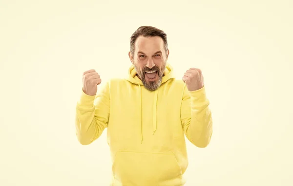 Happy handsome mature man with beard in hoody celebrate success isolated on white, success. — Fotografia de Stock