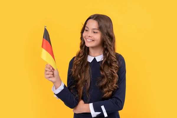 Kid travel and studying abroad. germany vacation. education in foreign school. girl football fan — Foto de Stock