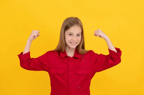 Glad teen girl with cute face on yellow background — Stok fotoğraf