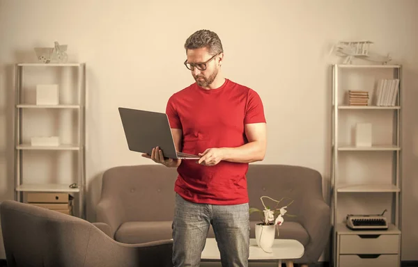 Mature man in glasses use laptop online, education — Stock Photo, Image