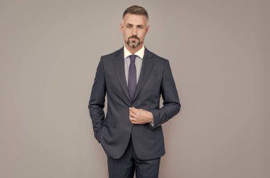 Always available. male formal fashion. professional unshaven ceo. grizzled boss. confident businessman
