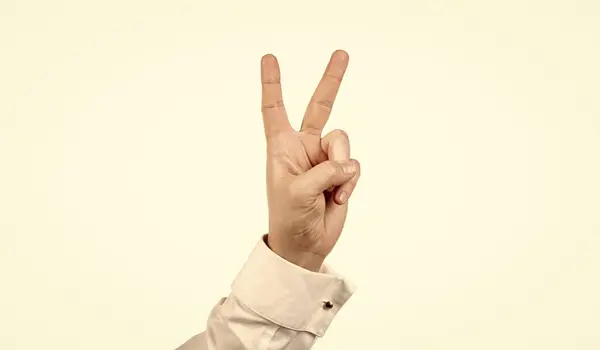 Geste de paix de la main masculine isolée sur fond blanc, geste — Photo