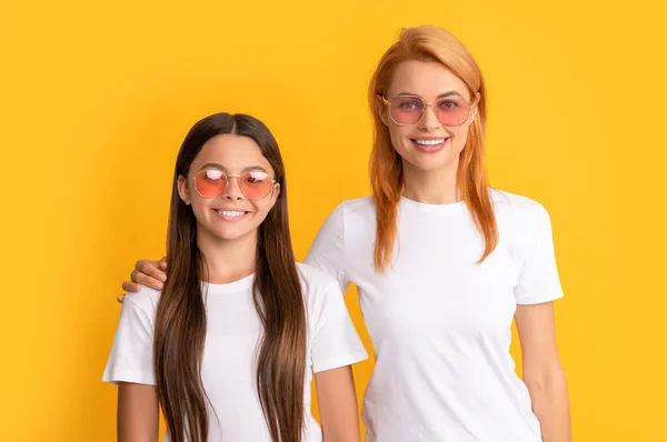 Cheerful family portrait of single mom and child girl in glasses, eyewear — Stock Photo, Image