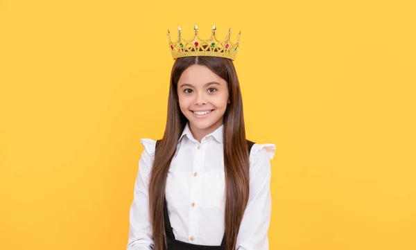 self confident queen kid. expressing smug. arrogant princess in tiara. proud teen girl smiling
