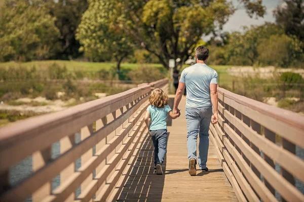 Happy Father Leading His Child Outdoor Back View Relationship — Stock Photo, Image