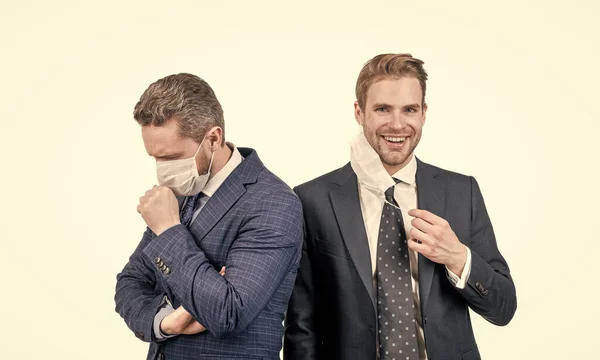 businessmen wear protective mask to avoid contact while covid19 coronavirus pandemic, healthcare.