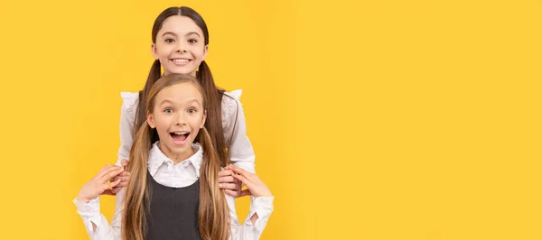 School girls friends. Prepared for success. Happy children learn together. Happy childhood. Childhood friends. Banner of school girl student. Schoolgirl pupil portrait with copy space