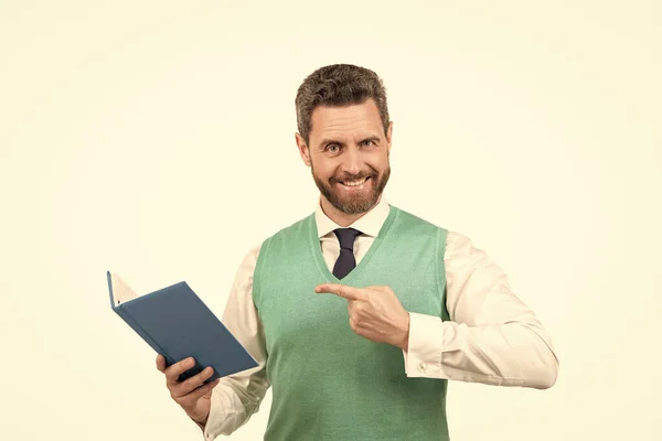 happy businessman pointing finger on book isolated on white background, education.