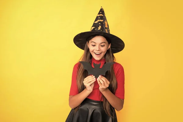 Surprised Kid Bat Wearing Witch Hat Yellow Background Childhood — Foto de Stock