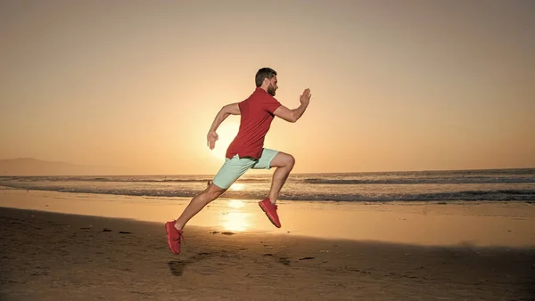 hurry up. endurance and stamina. sprinter. sport athlete run fast to win in sea sunset. morning workout activity. energetic man running on sunrise beach. energetic summer. runner feel freedom.
