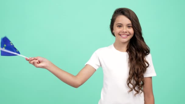 Portrait Happy Teen Girl Waving European Union Flag Blue Background — Video