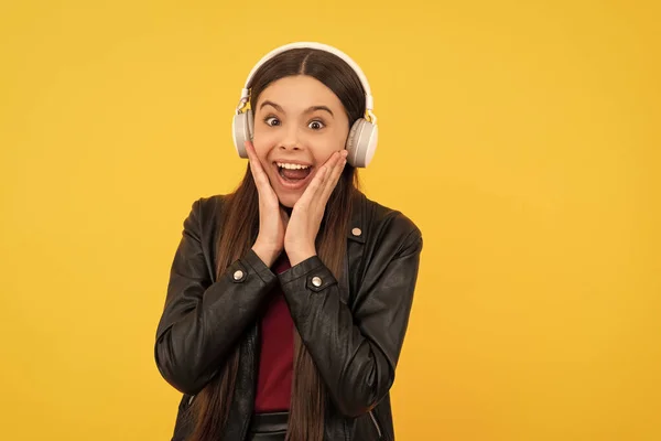 Amazed Child Headphones Yellow Background Music — 스톡 사진