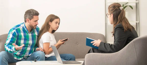 Psychologist give family therapy for dad mom and daughter girl, psychology. worried father talk to family psychologist about phone addicted child, family.