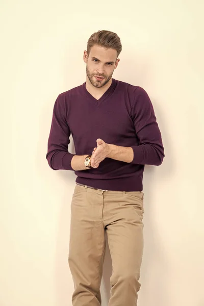 Mens wear. Handsome man wear pullover with pants. Casual outfit. Mens fashion. Trendy menswear. Feel comfortable wearing it.