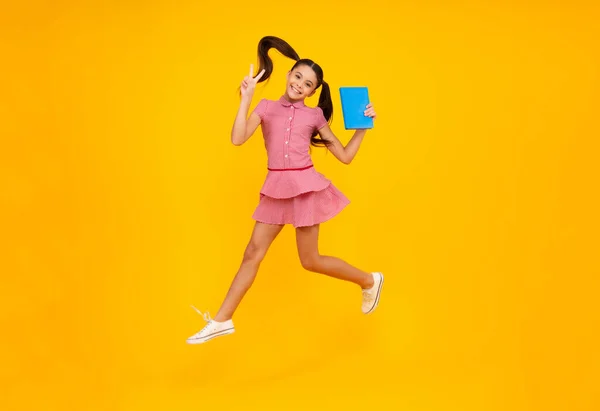 Teen Girl Pupil Hold Books Notebooks Isolated Yellow Background Copy — Stock Fotó