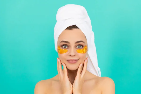 Young Woman Has Collagen Gold Eye Patches Face Towel — стоковое фото