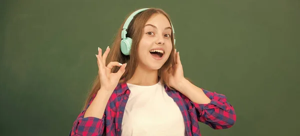 Cheerful Child Listen Music Headphones Blackboard Ebook — ストック写真