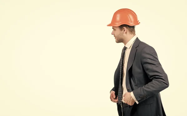 Professional man wear hardhat with formal suit isolated on white copy space, engineer.