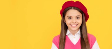 back to school. cheerful kid in beret ready to study. smiling child with book. teenage student. Child face, horizontal poster, teenager girl isolated portrait, banner with copy space