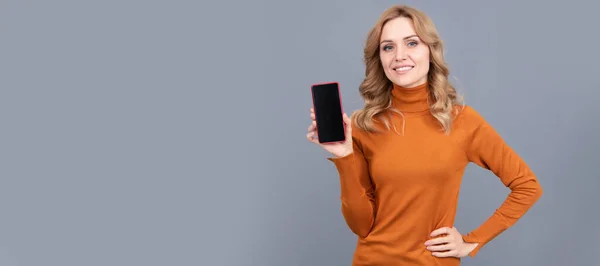 Happy Woman Hold Modern Smart Phone Grey Background Mobile Device — Zdjęcie stockowe