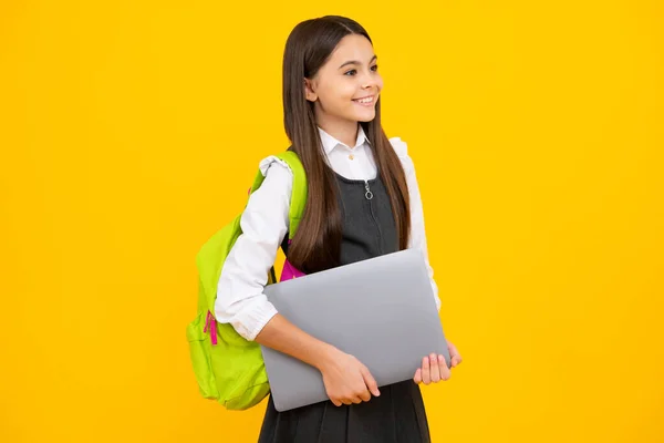 Schoolgirl School Uniform Laptop Schoolchild Teen Student Yellow Isolated Background — Zdjęcie stockowe
