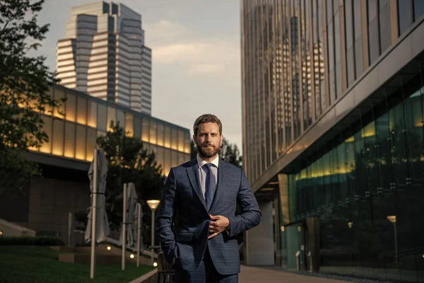 male formal fashion. confident bearded boss. confident businessman in formalwear. business success. successful man in businesslike suit. manager executive outside the office.