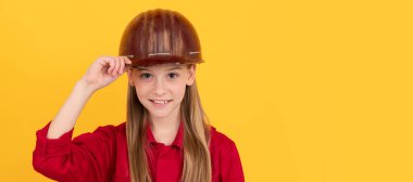 Architect teenager girl. future career of teen girl in helmet builder with concept of childhood development, happy labour day. Child builder in helmet horizontal poster design