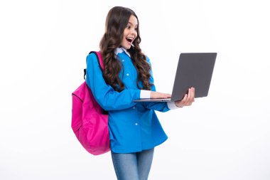 School child. Distance learning online distance education, studying remotely. Schoolgirl hold laptop. Excited face. Amazed expression, cheerful and glad