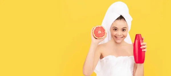 Happy Teen Child Towel Grapefruit Shampoo Bottle Yellow Background Cosmetics — 스톡 사진