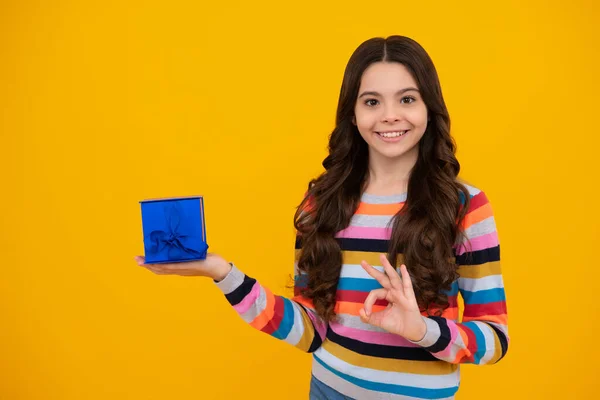 Happy Teenage Girl Teenager Child Holding Gift Box Isolated Yellow — Fotografia de Stock