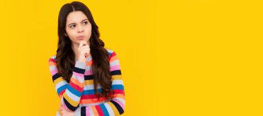 Thoughtful teenager girl touch chin and thinking, pensive child making idea. Child face, horizontal poster, teenager girl isolated portrait, banner with copy space