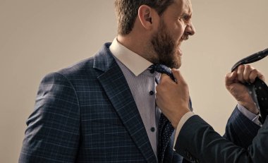 Experiencing aggression at work. Angry professional man fight with colleague. Workplace aggression and violence. Facing hostility. Physical assault.