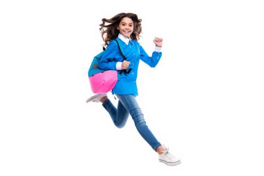 School teen with backpack. Teenager student, isolated background. Learning and knowledge. Go study. Run and jump. Education concept
