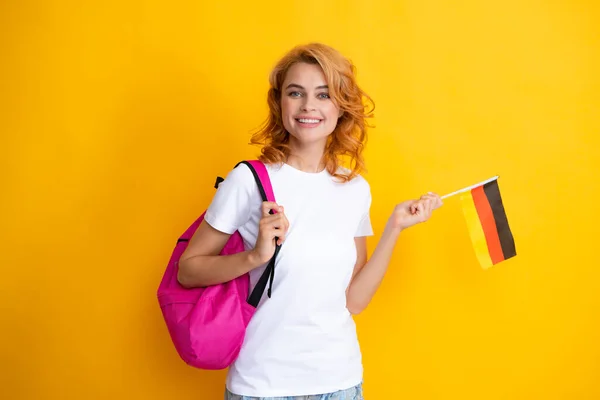 Woman portrait. Education and learning in Germany, immigration and travelling in Europe. Deutschland, deutsche flag. Germany flag, study in Germany. Female student.