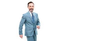 Man face portrait, banner with copy space. grizzled happy walking bearded ceo. confident boss with graying hair. copy space. businessman