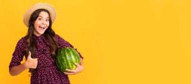 kid with fruit. healthy food for children. fructose healthy eating on summer vacation. Summer girl portrait with watermelon, horizontal poster. Banner header with copy space