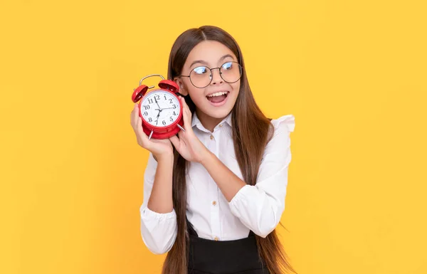 Amazed Teen Girl School Uniform Glasses Listen Alarm Clock Ringing — Foto de Stock